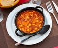 Tripe with chorizo and chickpeas served in bowl
