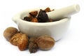 Triphala, a combination of ayurvedic fruits with mortar and pest