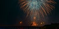 Triple fireworks above highway bridge Royalty Free Stock Photo