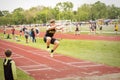 Triple Jump at High School Track Meet Royalty Free Stock Photo