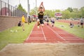 Triple Jump at High School Track Meet Royalty Free Stock Photo