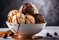 A triple scoop of chocolate, vanilla, and caramel swirl ice cream in a cup. Royalty Free Stock Photo