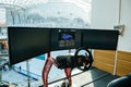 Triple screen setup with steering wheel and pedals racing games