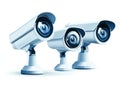 Triple surveillance cameras mounted together emphasizing security monitoring systems and technological integration in a high qu