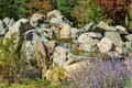 Triple waterfall splits into three streams in Japanese garden. Public landscape park of Krasnodar or Galitsky Park Royalty Free Stock Photo