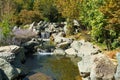 Triple waterfall splits into three streams in Japanese garden. Public landscape park of Krasnodar or Galitsky Park, Russia Royalty Free Stock Photo