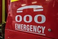 Triple zero emergency help line sign on a fire truck Royalty Free Stock Photo