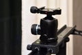 Tripod ball head mounted on camera slider