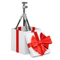 Tripod for camera or camcorder inside gift box, present concept. 3D rendering Royalty Free Stock Photo