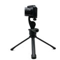 Tripod & camera isolated on white background.