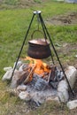 Tripod campfire cooking Royalty Free Stock Photo