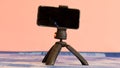 A tripod smartphone used for school online teaching based on a school chair