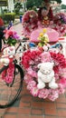 Trishaw decorated with colorful flowers in Malacca, Malaysia