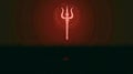 Trishula Symbol with Glowing Aura in Dark Field Royalty Free Stock Photo