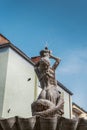 Triton Fountain in Nysa, Poland. .Marble sculpture representing baroque symbol of peace and harmony from 1701. Historic tenements