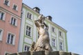 Triton Fountain in Nysa, Poland. .Marble sculpture representing baroque symbol of peace and harmony from 1701. Historic tenements