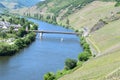 Trittenheim, Germany - 06 01 2021: Mosel bridge at Trittenheim with a small boat below