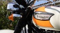 Triumph bonneville motorcycle detail sign text and logo on retro chrome fuel tank on