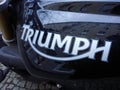 Triumph logo on black motorcycle