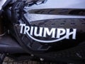 Triumph logo on black motorcycle