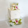 Triumph wedding cake with square cube glass construction