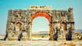 Triumphal Arch in the ancient city of Volubilis, Morocco Royalty Free Stock Photo