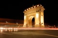 The Triumphal Arch Arcul de Triumf in Bucharest, the capital of Romania. Historic monument Royalty Free Stock Photo