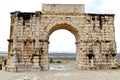 Triumphal arch at ruins of the roman city Volubilis in Morocco Royalty Free Stock Photo