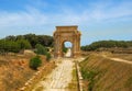 Triumphal Arch of Septimius Severus at ancient Roman ruins of Leptis Magna on the Mediterranean coast of Libya in North Africa Royalty Free Stock Photo