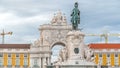 Triumphal arch at Rua Augusta and bronze statue of King Jose I at Commerce square in Lisbon, Portugal. Royalty Free Stock Photo