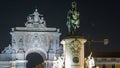 Triumphal arch at Rua Augusta and bronze statue of King Jose I at Commerce square night in Lisbon, Portugal. Royalty Free Stock Photo