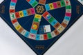 Trivial Pursuit game pieces which is a board game