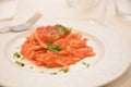 Trofie italian pasta with tuna fish sauce goumet food on white table