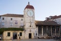 The clock tower and the city loggia on the main square in the old town of Trogir Royalty Free Stock Photo