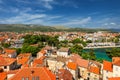 Trogir in Croatia, town panoramic view with red roof tiles, Croatian tourist destination. Trogir town sea front view, Croatia. Royalty Free Stock Photo