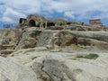 Troglodyte village with white rocks and caves of Uplistsikhe in Georgia.