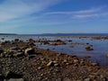 Troitsk pier near the Holy Trinity Anzersky skete of the Solovki monastery on the Anzersky island, the Solovki islands Royalty Free Stock Photo