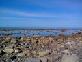 Troitsk pier near the Holy Trinity Anzersky skete of the Solovki monastery on the Anzersky island, the Solovki islands Royalty Free Stock Photo