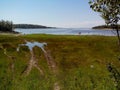 Troitsk pier near the Holy Trinity Anzersky skete of the Solovki monastery on the Anzersky island, the Solovki islands, Royalty Free Stock Photo