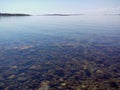 Troitsk pier near the Holy Trinity Anzersky skete of the Solovki monastery on the Anzersky island, the Solovki islands, Royalty Free Stock Photo