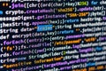 Trojan. A close-up of a computer screen displaying colorful text with encryption codes data, encrypt, decrypt, SHA256 Royalty Free Stock Photo