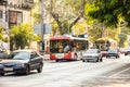 Trolley bus, cars. The outside