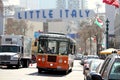 Trolley Bus Driving through Little Italy in San Diego Royalty Free Stock Photo