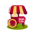 Trolley with popcorn machine. Carnival vending cart. Tasty snack. Cartoon vector design Royalty Free Stock Photo