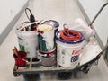 17-12-2020 a trolley of professional house painter work tools Brushes, roller, container, plastic sheet and protective tape in Royalty Free Stock Photo