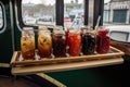 trolley with variety of iced teas and coffees on board Royalty Free Stock Photo