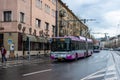 CLUJ-NAPOKA, ROMANIA - April 27, 2022. Trolleybus Astra and bus Solaris riding with passengers in the streets of Cluj-Napoka.