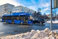 The trolleybus is moving along the street, in the city of Yoshkar-Ola.