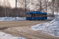 The trolleybus is moving along the street, in the city of Yoshkar-Ola.