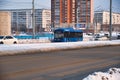 The trolleybus is moving along the street, in the city of Yoshkar-Ola.